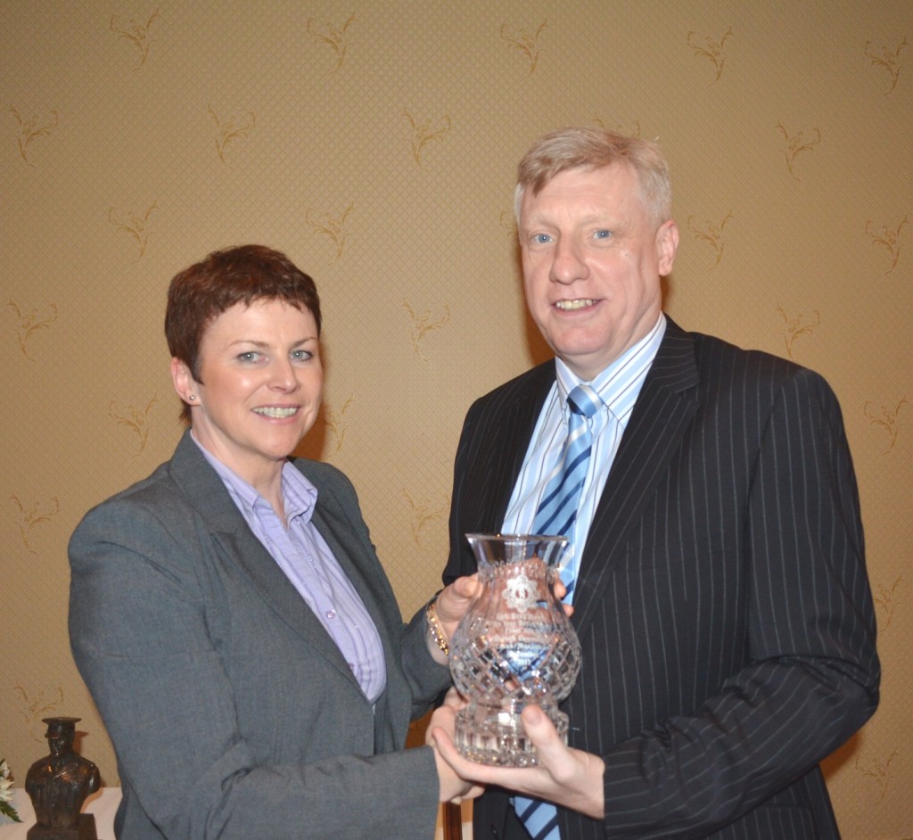 Regina McArdle Chairperson Cavan/Monaghan Branch makes a presentation to Eric
