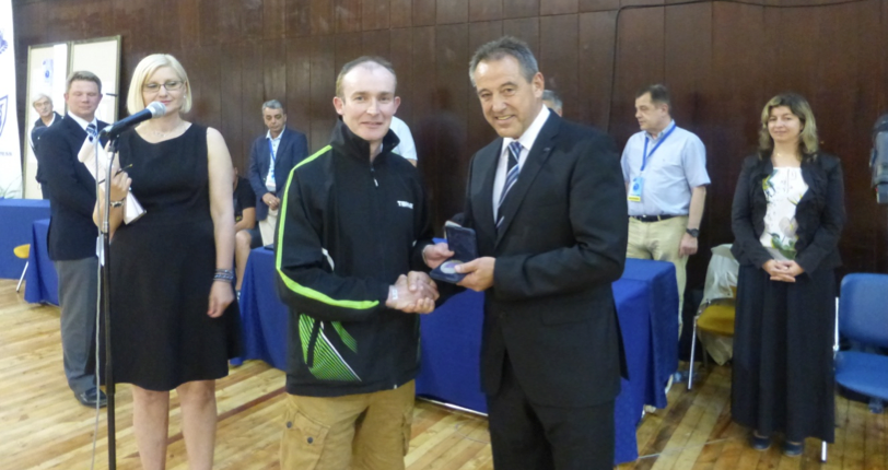 Sgt Adrian Flynn (Ireland) receiving inaugural Union Sportive des Polices D’Europe Award from Mr Harry Brungger USPE Executive Committee