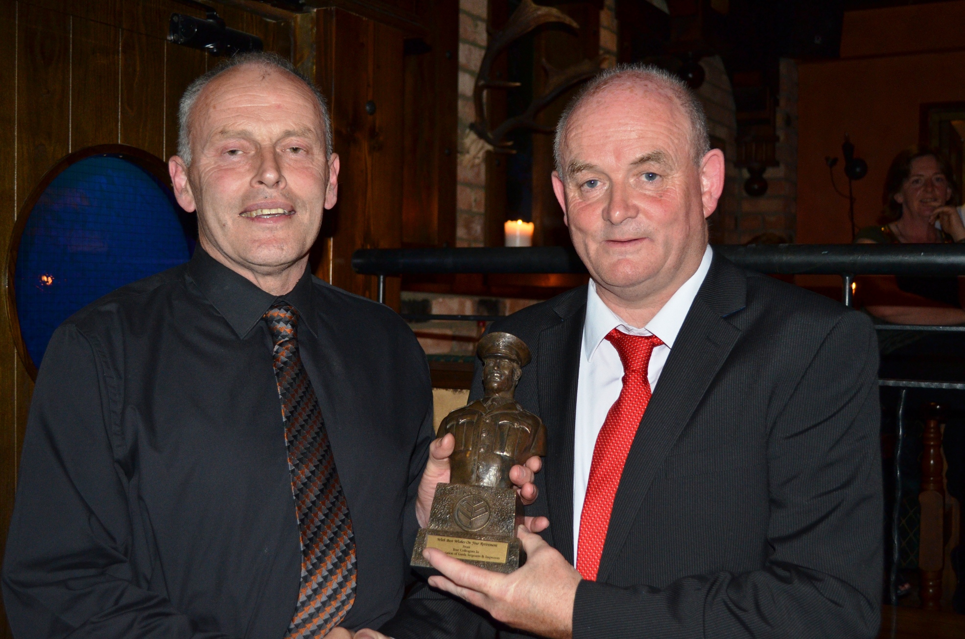 Martin Conroy, Cavan/ Monaghan presents Podge with the AGSI retirement bust